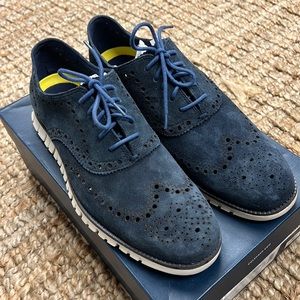 Brand new Cole Haan suede winged Oxford shoes. In the box.